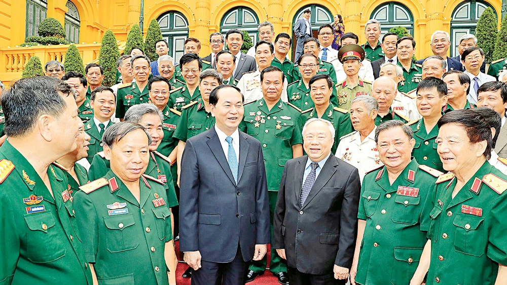 Chủ tịch nước Trần Đại Quang gặp mặt thân mật Đoàn đại biểu cựu quân tình nguyện Việt Nam giúp Campuchia