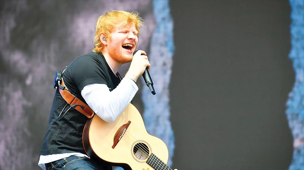 Ed Sheeran - ca sĩ của Anh hiện có album bán chạy nhất toàn cầu