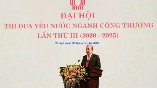 Phó Thủ tướng Trương Hòa Bình phát biểu tại Đại hội thi đua yêu nước ngành công thương. Ảnh: Đức Duy/Vietnam+