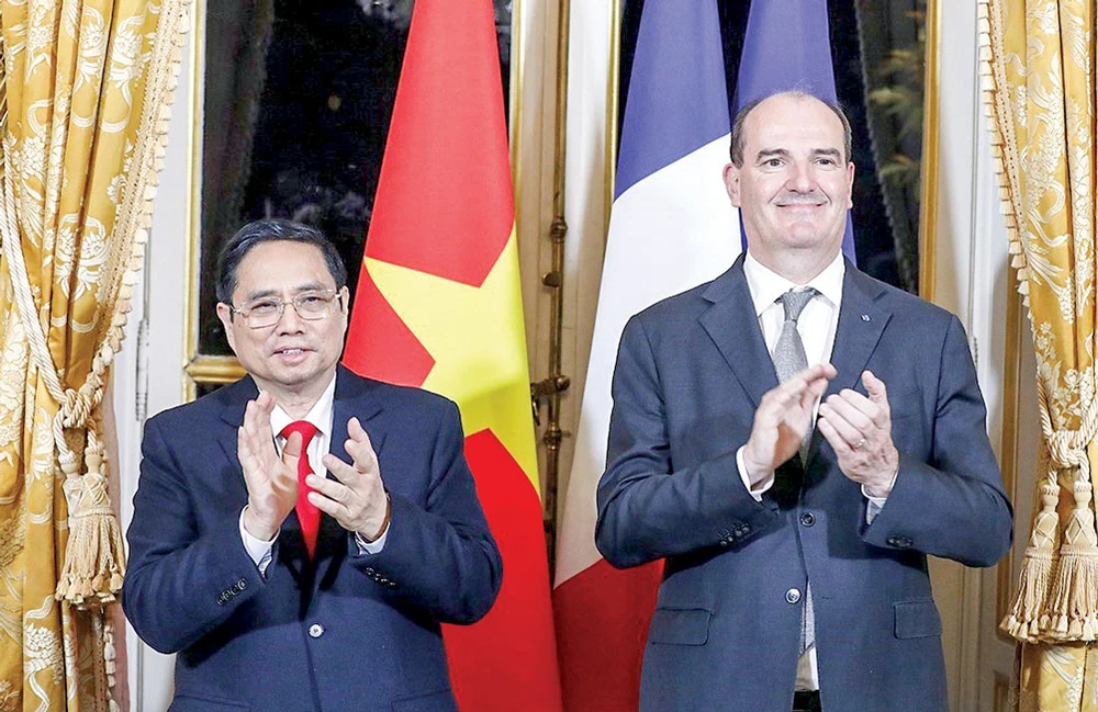 Thủ tướng Phạm Minh Chính và Thủ tướng Pháp Jean Castex Ảnh: TTXVN