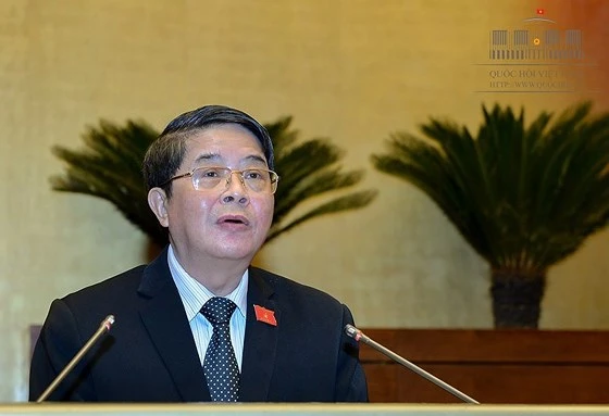 Chủ nhiệm Ủy ban Tài chính ngân sách của Quốc hội Nguyễn Đức Hải trình bày báo cáo thẩm tra Về thí điểm cơ chế, chính sách đặc thù phát triển TPHCM. Ảnh: quochoi