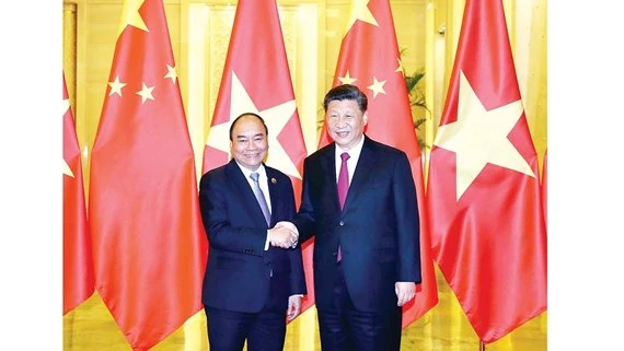 Thủ tướng Nguyễn Xuân Phúc hội kiến Tổng Bí thư Ban Chấp hành Trung ương Đảng Cộng sản Trung Quốc, Chủ tịch nước Cộng hòa Nhân dân Trung Hoa Tập Cận Bình Ảnh: TTXVN