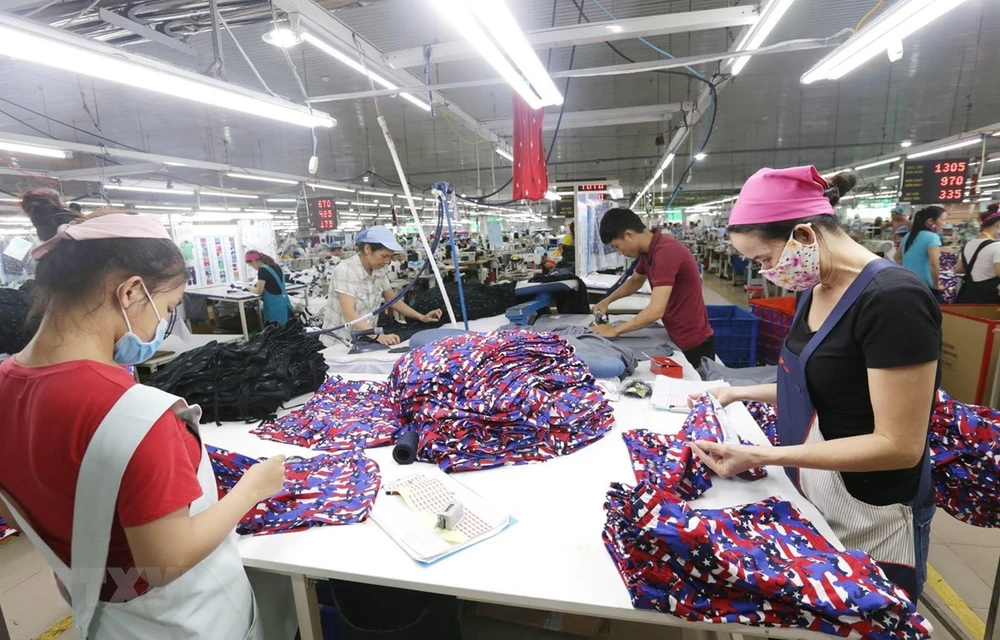 Các dây chuyền dệt may của công ty Cổ phần dệt may Phú Hòa An tại KCN Phú Bài, tỉnh Thừa Thiên Huế. (Ảnh: Anh Tuấn/TTXVN)