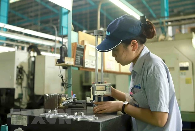 Hoạt động sản xuất tại Công ty trách nhiệm hữu hạn Strong Way khu công nghiệp Khai Quang, tỉnh Vĩnh Phúc. Ảnh minh họa. (Ảnh: Hoàng Hùng/TTXVN)