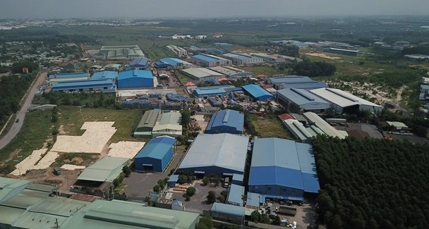 Hàng chục doanh nghiệp xây dựng nhà xưởng trong khu đất quy hoạch cụm công nghiệp Phước Tân chưa được cấp phép. (Ảnh: Sỹ Tuyên/TTXVN)