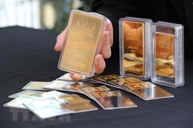 Vàng miếng tại sàn giao dịch vàng ở Seoul, Hàn Quốc. (Nguồn: Yonhap/TTXVN)