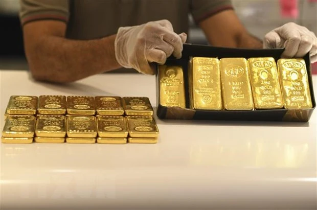 Vàng miếng được bày bán tại một cửa hàng ở Dubai, Các tiểu vương quốc Arab thống nhất (UAE). (Ảnh: AFP/TTXVN)
