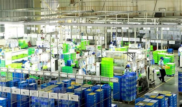 Dây chuyền sản xuất tại Công ty Ohashi Tekko Việt Nam khu công nghiệp Bình Xuyên. (Ảnh: Hoàng Hùng/TTXVN)