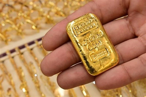 Vàng được bày bán tại một cửa hàng vàng ở Dubai (UAE). (Ảnh: AFP/TTXVN)