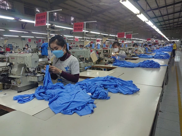 40% doanh nghiệp ở Long An đã quay trở lại sản xuất. Họ được phép sử dụng tối đa lượng lao động có nhu cầu - Ảnh: AN LONG