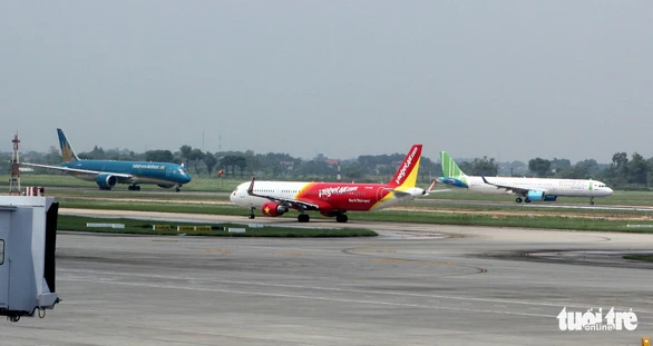 Vietnam Airlines, Bamboo Airways, Pacific Airlines đồng ý có giá sàn vé máy bay trên 0 đồng, còn Vietjet và Vietravel Airlines cho rằng giá sàn gây nhiều tác động tiêu cực - Ảnh: TUẤN PHÙNG