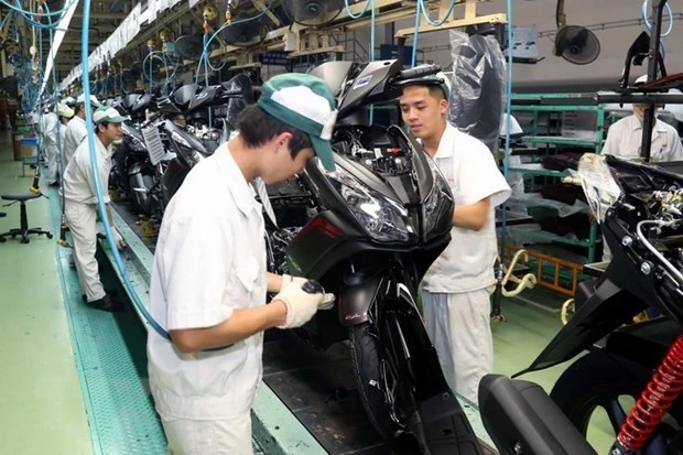 Công nhân nhà máy Honda Việt Nam tại Hà Nam - ảnh chụp trước khi có dịch COVID-19. (Ảnh: TTXVN)