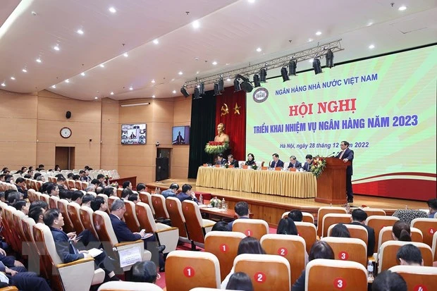 Thủ tướng Phạm Minh Chính phát biểu tại Hội nghị tổng kết công tác năm 2022 và triển khai nhiệm vụ ngân hàng năm 2023. (Ảnh: Dương Giang/TTXVN)