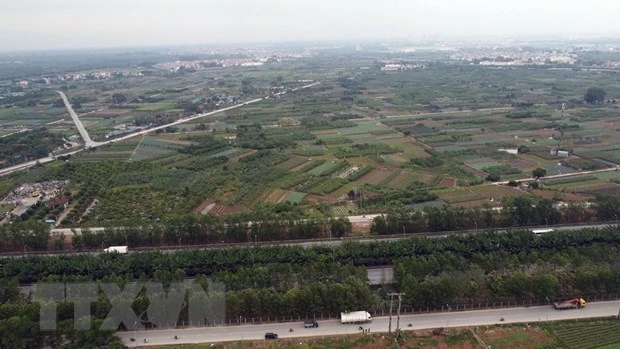 Tuyến vành đai 4 qua đại lộ Thăng Long trên địa bàn xã Song Phương. (Ảnh: Huy Hùng/TTXVN)