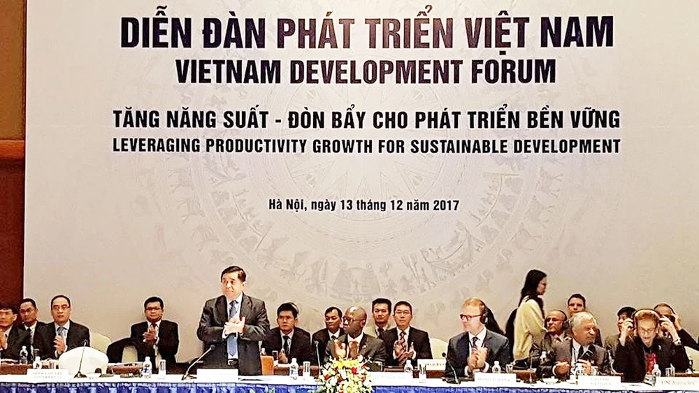 Bộ trưởng Bộ Kế hoạch và Đầu tư Nguyễn Chí Dũng phát biểu khai mạc Diễn đàn 