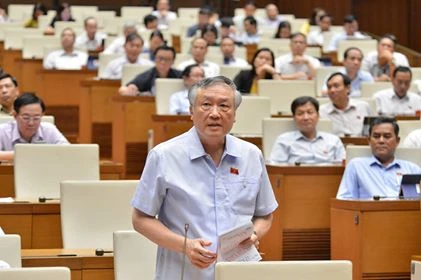 Chánh án Tòa án Nhân dân tối cao Nguyễn Hòa Bình phát biểu tại phiên họp sáng 15-6. Ảnh: VIẾT CHUNG