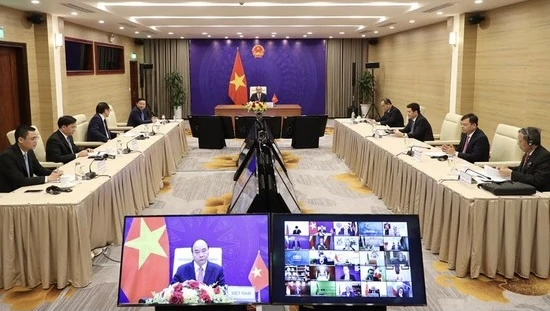 Chủ tịch nước Nguyễn Xuân Phúc phát biểu tại Hội nghị Thượng đỉnh trực tuyến về biến đổi khí hậu. Ảnh: QUANG PHÚC