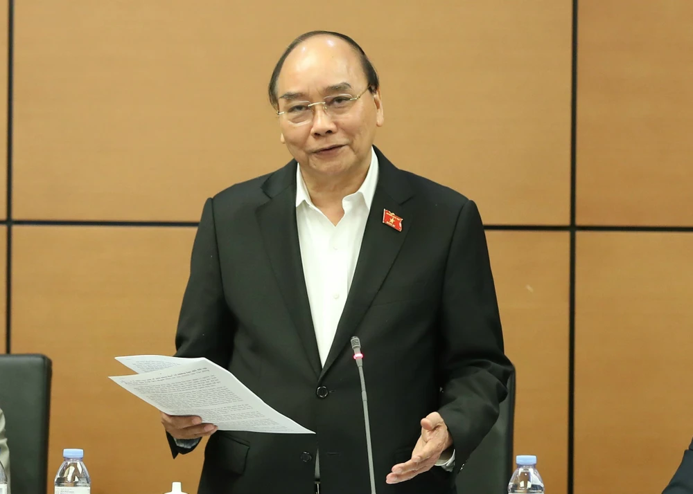Chủ tịch nước Nguyễn Xuân Phúc phát biểu tại tổ đại biểu TPHCM về dự thảo Quy hoạch tổng thể quốc gia. Ảnh: QUANG PHÚC