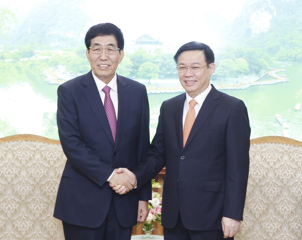 政府副總理王廷惠(右)會見吉林省委書記巴音朝魯。