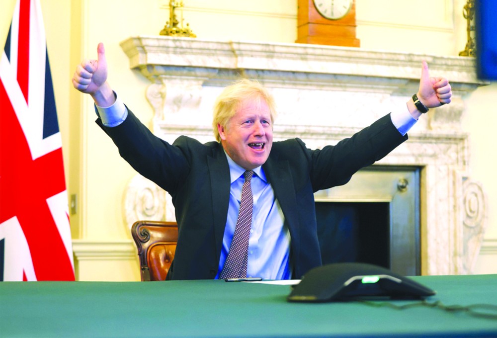 英國首相鮑里斯‧約翰遜在倫敦的首相府慶祝英歐雙方達成協議。