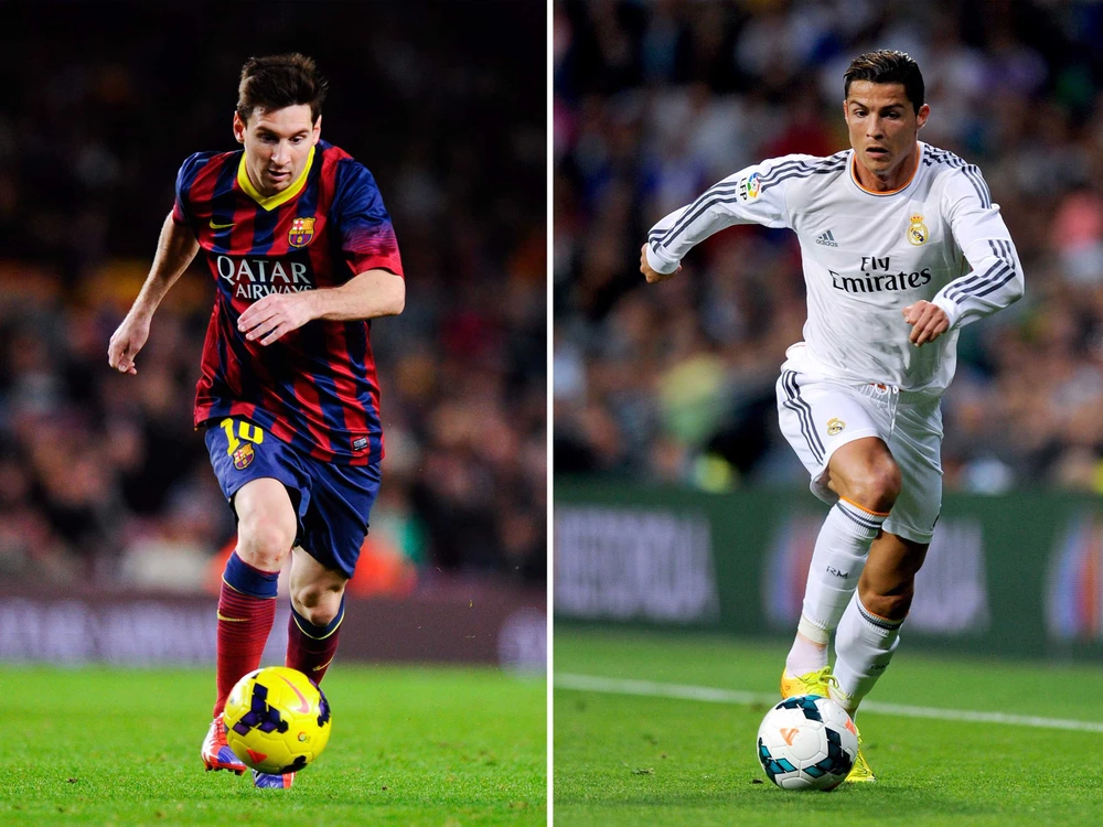 Lionel Messi và Cristiano Ronaldo trong cuộc chiến El Clasico. Ảnh Getty Images.