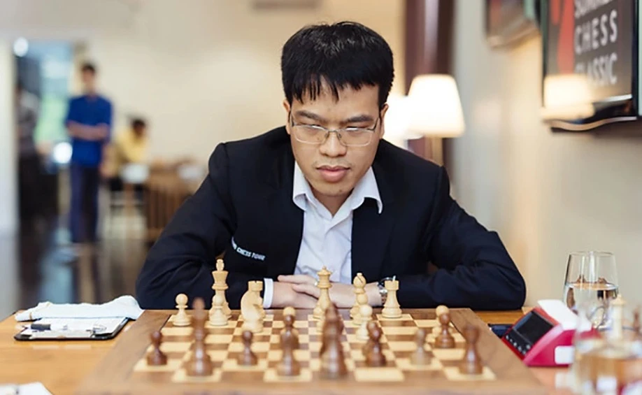 Lê Quang Liêm sẽ thi đấu tiếp các ván cờ nhanh, cờ chớp ở lượt play-off. Ảnh: FIDE