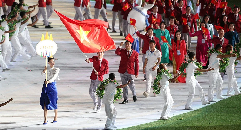 Tuyển thủ Nguyễn Huy Hoàng tiếp tục là người cầm cờ cho Đoàn thể thao Việt Nam. Ảnh: DŨNG PHƯƠNG