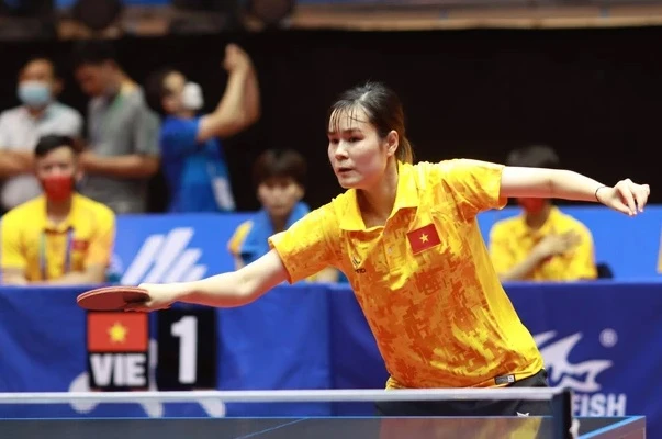 Tuyển thủ Nguyễn Thị Nga thua tay vợt của Singapore trong ngày thi đấu 28-9. Ảnh: CỤC TDTT