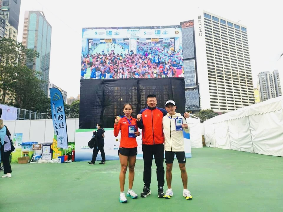 Hoàng Nguyên Thanh và Hoàng Thị Ngọc Hoa đã thi đấu marathon châu Á 2024. Ảnh: NGUYÊN THANH