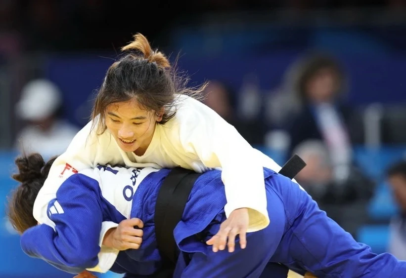 Tuyển thủ Hoàng Thị Tình (judo) là người đầu tiên dừng bước ở Olympic 2024 của Đoàn thể thao Việt Nam. Ảnh: TTXVN