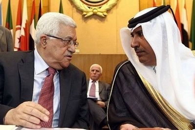 Palestinian president Mahmud Abbas (L) speaks with Qatari Foreign Minister Sheikh Hamad bin Jassem al-Thani during a meeting for the Arab Peace Initiative committee in Cairo. Palestinian president Mahmud Abbas (L) speaks with Qatari Foreign Minister Sheikh Hamad bin Jassem al-Thani during a meeting for the Arab Peace Initiative committee in Cairo.