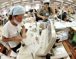 Tạm thời thực hiện cơ chế điều hành xuất khẩu hàng dệt may vào Mỹ
