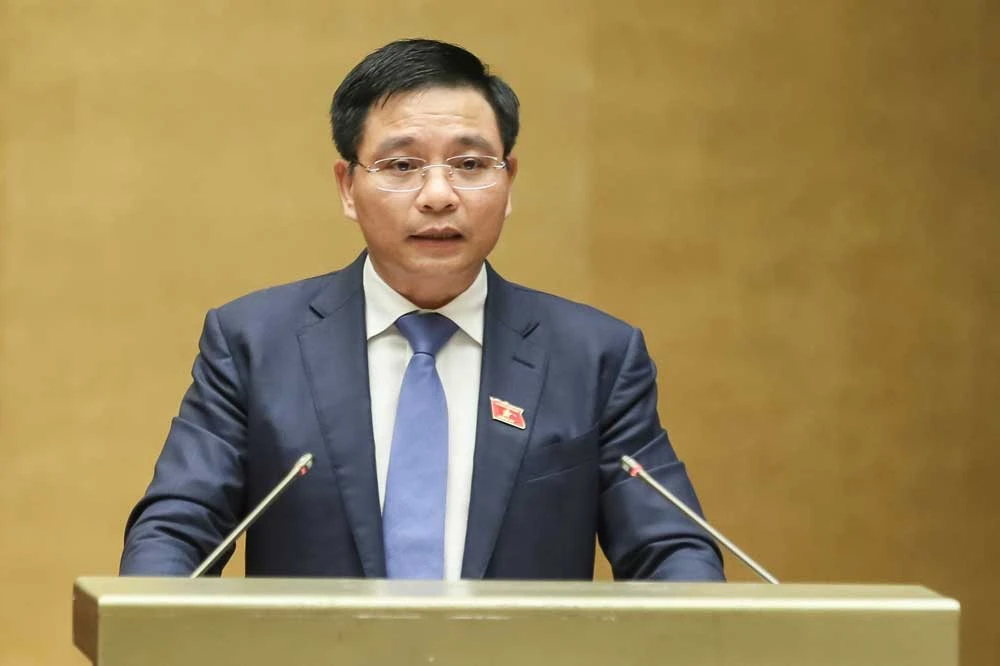 Bộ trưởng Bộ GTVT Nguyễn Văn Thắng trả lời chất vấn chiều 7-6. Ảnh: QUANG PHÚC