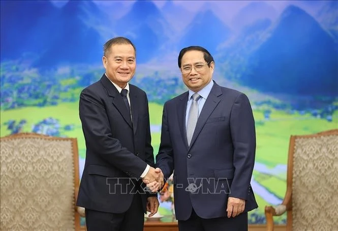 Thủ tướng Phạm Minh Chính tiếp Tổng Giám đốc Thông tấn xã Pathet Lào (KPL) Khampheuy Philapha. Ảnh: TTXVN