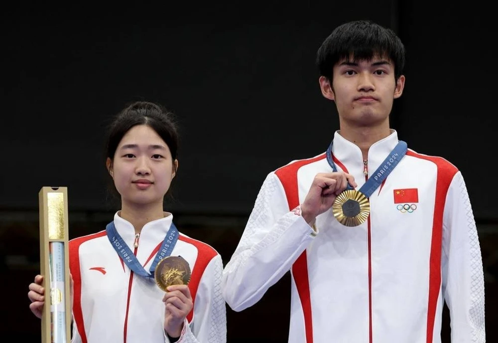 Những nhà vô địch đầu tiên ở Olympic Paris. Ảnh: AFP