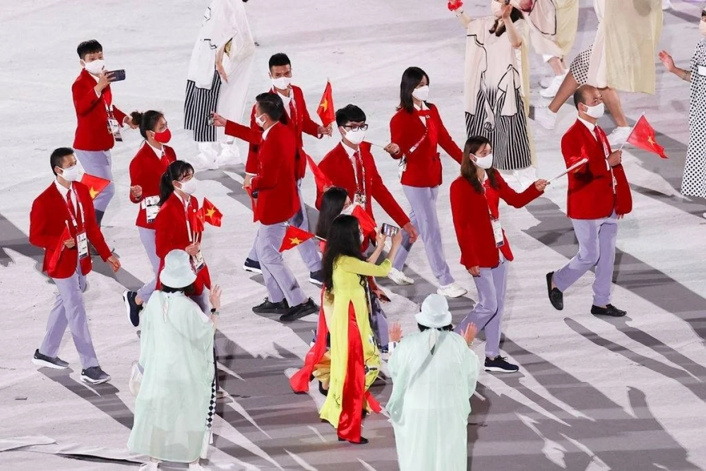 Đoàn thể thao Việt Nam diễu hành tại Lễ khai mạc Olympic Tokyo 2020. Ảnh: Getty Images