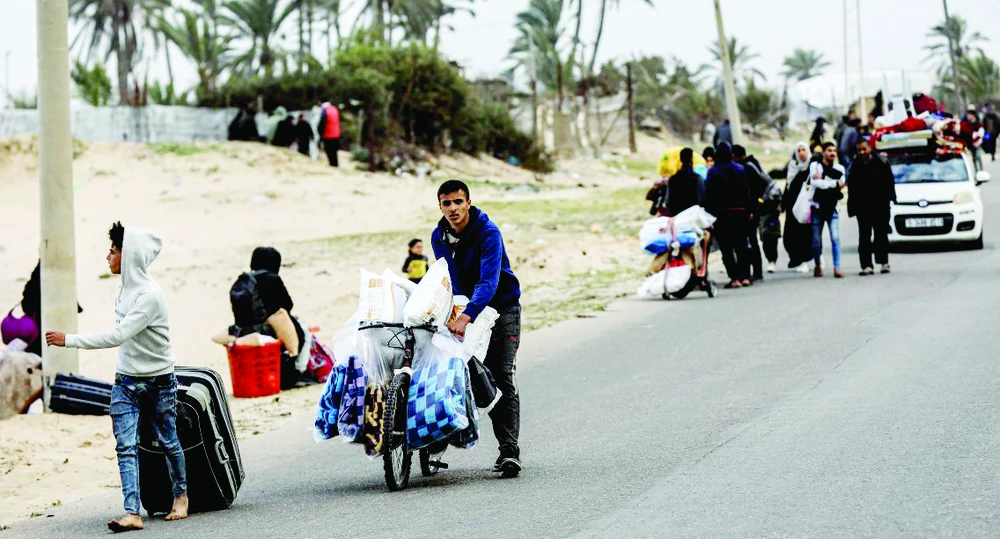 Người dân thành phố Khan Younis thuộc miền Nam Dải Gaza di tản