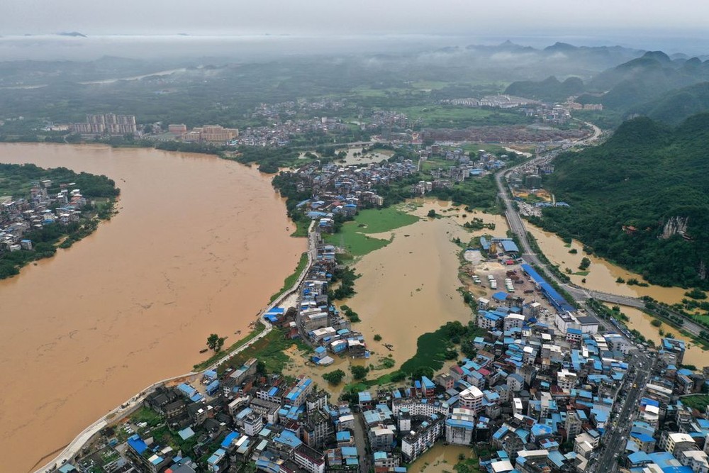 中國廣西融水苗族自治縣暴雨，融江本月4日氾濫成災。新華社