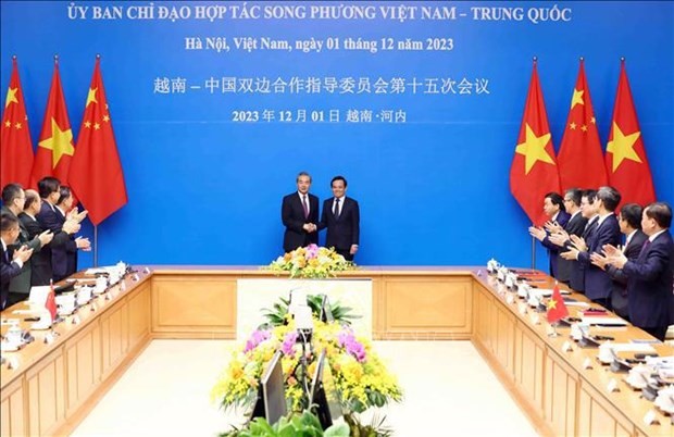 越南政府副总理陈留光与中国外交部长王毅共同主持越中双边合作指委会第15次会议。图自越通社