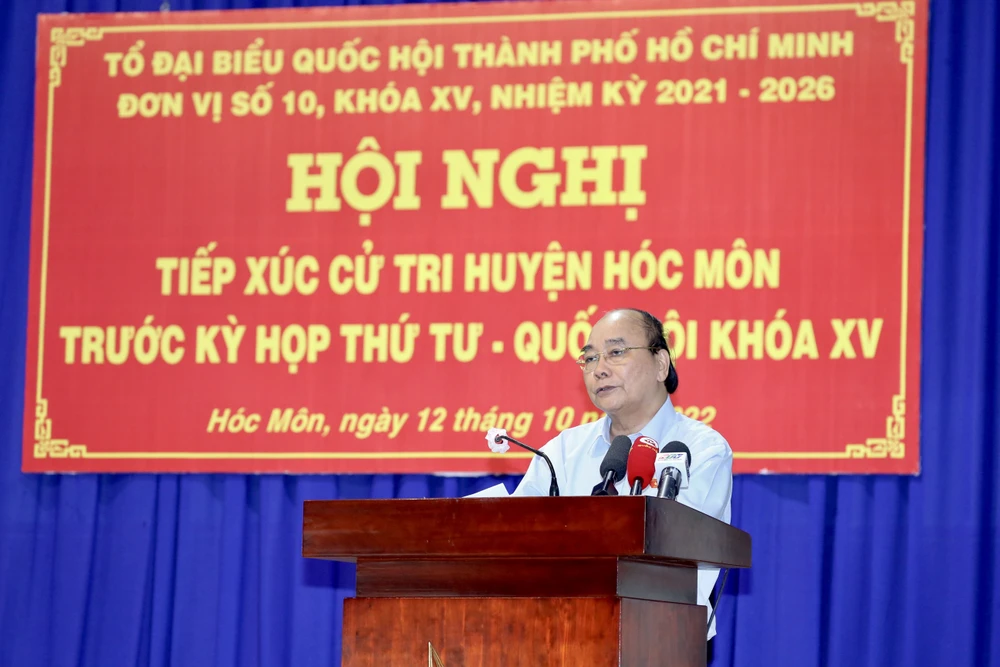 Chủ tịch nước Nguyễn Xuân Phúc phát biểu tại buổi tiếp xúc cử tri. Ảnh: HOÀNG HÙNG