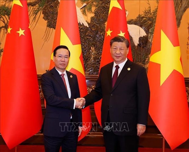 越南国家主席武文赏会见中共中央总书记、国家主席习近平。