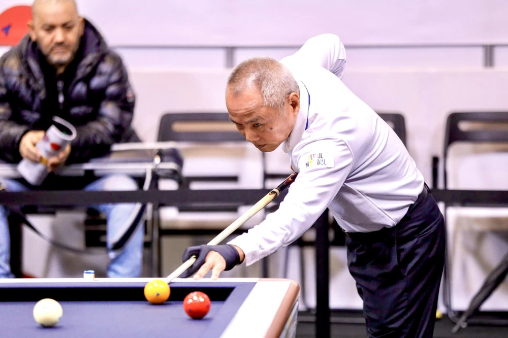 Dù 61 tuổi nhưng cơ thủ Hồ Văn Tân vẫn dự giải World Cup