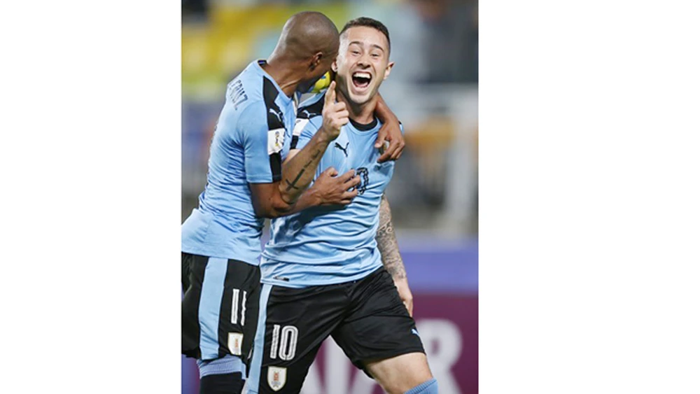 Niềm vui chiến thắng của các cầu thủ Uruguay