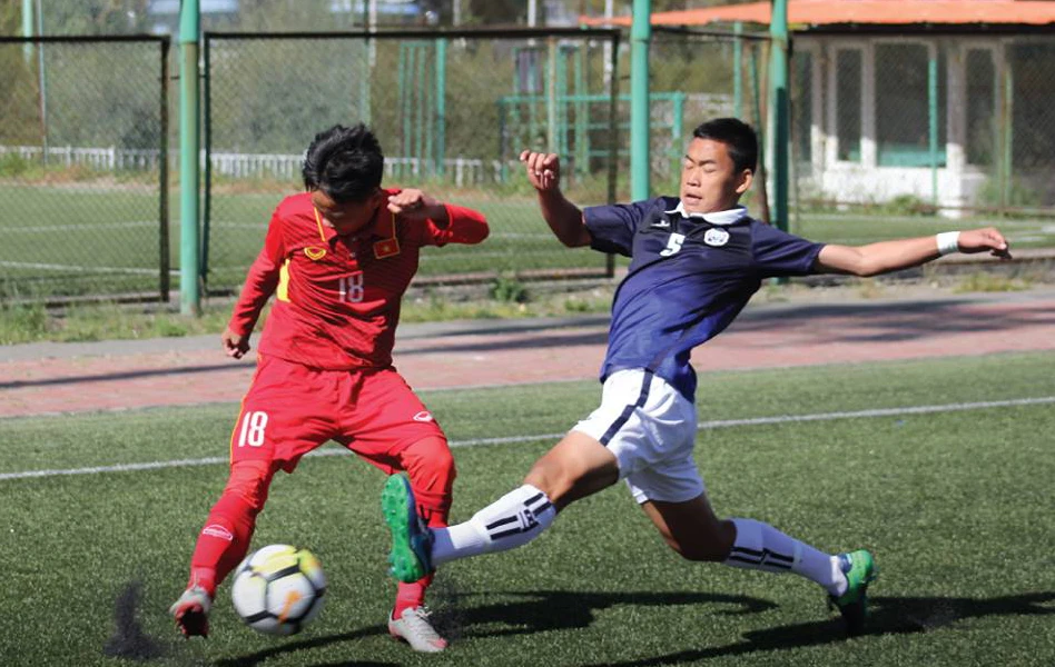 Đội U16 Việt Nam (áo đỏ) khởi đầu thuận lợi tại vòng loại giải châu Á. (Ảnh: VFF)