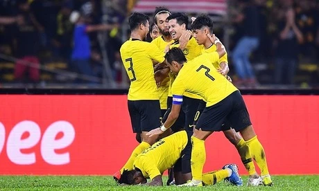 Niềm vui của các cầu thủ Malaysia khi ngược dòng giành 3 điểm trước Thái Lan. Ảnh: FAM