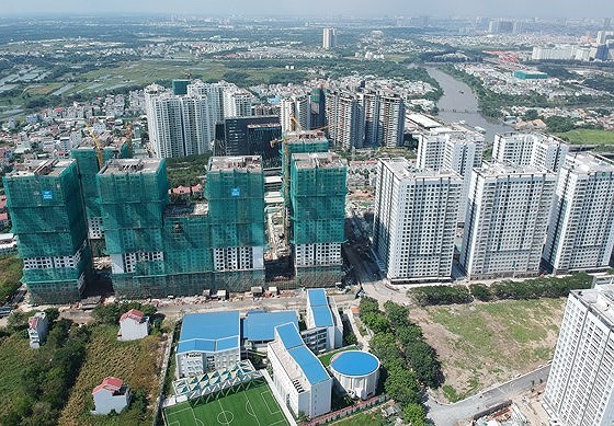 Many housing projects are under construction in Nha Be District in Ho Chi Minh City. (Photo: SGGP)