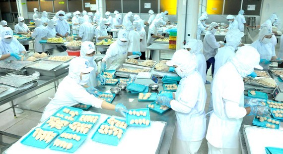 Food processing at the factory of CJ Group invested in Ho Chi Minh City. (Photo: SGGP)