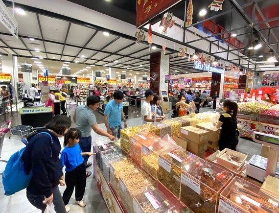 Sweetmeat for Tet holidays sold at a supermarket. (Photo: SGGP)