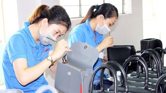 Handbag production at Binh Tien Company in Dong Nai Province. (Photo: SGGP)