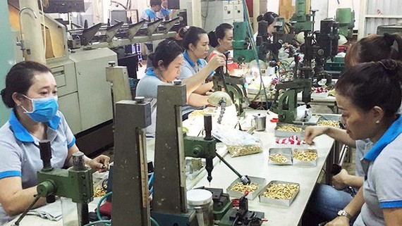 Components manufacturing for export at a mechanical enterprise in Ho Chi Minh City. (Photo: SGGP)